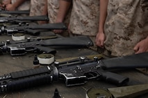 U.S. Marine Corps recruits with Echo Company, 2nd Recruit Training Battalion, inventory their new gear during a M16A4 service rifle issue at Marine Corps Recruit Depot San Diego, California, April 8, 2024. Recruits were issued their rifles and briefed on responsibilities regarding rifle security, safety and proper handling. (U.S. Marine Corps photo by Cpl. Alexander O. Devereux)