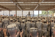 U.S. Marine Corps recruits with Echo Company, 2nd Recruit Training Battalion, receive instructions during M16A4 service rifle issue at Marine Corps Recruit Depot San Diego, California, April 8, 2024. Recruits were issued their rifles and briefed on responsibilities regarding rifle security, safety and proper handling. (U.S. Marine Corps photo by Cpl. Alexander O. Devereux)