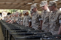 U.S. Marine Corps recruits with Echo Company, 2nd Recruit Training Battalion, receive instructions during their M16A4 service rifle issue at Marine Corps Recruit Depot San Diego, California, April 8, 2024. Recruits were issued their rifles and briefed on responsibilities regarding rifle security, safety and proper weapons handling. (U.S. Marine Corps photo by Cpl. Alexander O. Devereux)