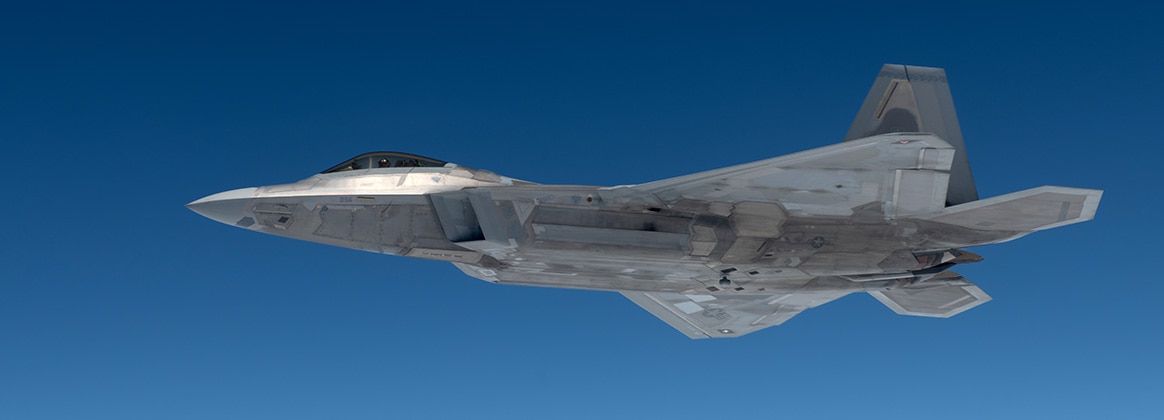 240410-F-PW483-1006 PACIFIC OCEAN (April 10, 2024) An F-22A Raptor assigned to the 19th Fighter Squadron, Joint Base Pearl Harbor–Hickam, Hawaii, flies alongside a 909th Air Refueling Squadron KC-135 Stratotanker during a large force exercise over the Pacific Ocean, April 10, 2024. The exercise incorporated fourth and fifth generation aircraft in advanced aerial combat and provided a platform for enhanced cooperation between home station and rotational fighter units. (U.S. Air Force photo by Staff Sgt. Jessi Roth)