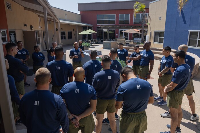 U.S. Marine Corps 1st Sgt. Kelvin Carrington, company 1st Sgt with India Company, 3rd Recruit Training Battalion, speaks to the Marines during a volunteer event at a Ronald McDonald House in San Diego, California, April 8, 2024. The Ronald McDonald House provides a home away from home at no cost for families with sick and injured children, ages 21 and younger. (U.S. Marine Corps photo by Lance Cpl. Janell B. Alvarez)