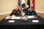 U.S. Army Maj. Gen. Brian Gibson, U.S. Space Command strategy, plans and policy director, signs a Memorandum of Agreement for a liaison officer with Maj. Gen. Eric Cólen, Brazilian Space Operations Center commander, during the 39th Annual Space Symposium in Colorado Springs, Colorado, April 11, 2024. This agreement builds upon the relationship with Brazil and emphasizes the importance of South American nations to the space domain. USSPACECOM, working with Allies and Partners, plans, executes, and integrates military spacepower into multi-domain global operations in order to deter aggression, defend national interests, and when necessary, defeat threats.