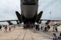 The Great Texas Airshow attendees walk into the back entrance of the 433rd Airlift Wing’s C-5M Super Galaxy located near the entrance of the airshow at Joint Base San Antonio-Randolph, Texas Apr. 7, 2024.