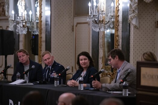  U.S. Space Force Col. Christopher A. Kennedy, Space Delta 6 - Space Access and Cyberspace Operations commander, listens as fellow panelist talk.