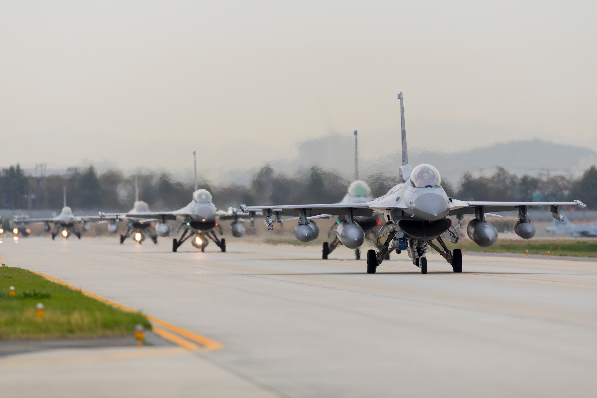 U.S. Air Force F-16 Fighting Falcons from the 8th Fighter Wing, Kunsan Air Base, Republic of Korea, and KF-16 Fighting Falcons with the ROK Air Force taxi on the flight line after arriving for the Fiscal Year 2023 Korea Flying Training at Gwangju AB, ROK, April 14, 2023.