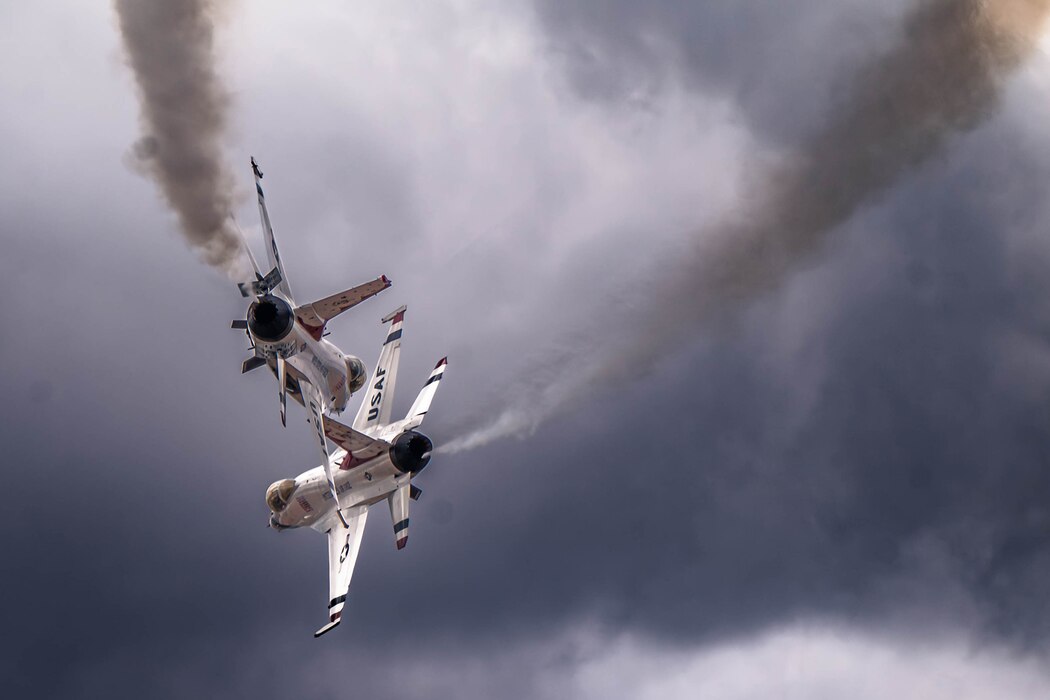 F-16 Fighting Falcons, assigned to the U.S. Air Force Demonstration team, the “Thunderbirds,” execute a choreographed demonstration