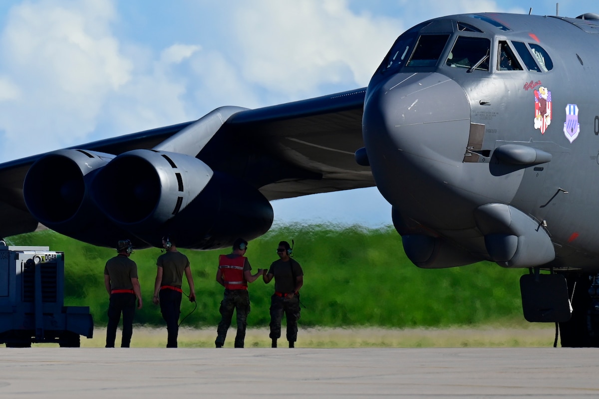 U.S. Air Force Airmen from the 96th Aircraft Maintenance Squadron prepare a B-52 Stratofortress assigned to Barksdale Air Force Base, La., to return home from a Bomber Task Force deployment at Navy Support Facility Diego Garcia, April 3, 2024. BTF missions enable crews to maintain a high state of readiness and proficiency and validate our always-ready global strike capability. (U.S. Air Force photo by Master Sgt. Staci Kasischke)
