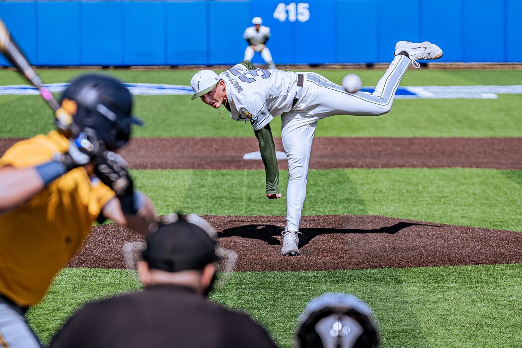 U.S. Air Force Academy cadet Jimmy Hebenstreit throws a pitch during a game