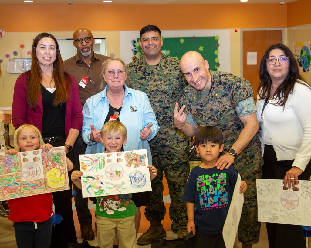 The MCLB Barstow Environmental Division, along with others, host Earth Day Outreach Coloring Contest with students and teachers at the School Aged Care (SAC) program aboard Marine Corps Logistics Base (MCLB)  - Barstow on April 10, 2024. The focus of Earth Day 2024 is Planet vs. Plastics, with the goal of increasing consciousness about the issue of plastic pollution and how future generations can make a difference.

*Pictured: Alicia Flores, SF Facilities Director, Dexter Robeson, Environmental Director, Cathey Donaldson, CETEP Coordinator, MSgt. Marcelino Rangel, Operations Chief, Maj. Narciso Corral, S3 Operations Director, and Veronica Mears, Assistant Operations Officer MCCS.
