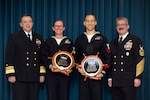 WASHINGTON (April 11, 2024) Vice Adm. James P. Downey, commander, Naval Sea Systems Command (NAVSEA) (left) announced Hull Technician 1st Class Jennifer Schleuning from Southeast Regional Maintenance Center, Jacksonville, Fla. (second from left) and Machinist Mate 1st Class Matthew Lipscomb from Puget Sound Naval Shipyard, Everett, Wash. (second from right) NAVSEA Sailor of the Year (SOY) for the active duty and reservist categories. NAVSEA’s senior enlisted Sailor Command Master Chief Blake G. Schimmel (right).
 
As NAVSEA’s top enlisted Sailors Schleuning and Lipscomb will now compete for the Navy’s highest enlisted awards, Chief of Naval Operations Shore and Reserve SOY.
 
NAVSEA is the largest of the US Navy's six systems commands. With a force of nearly 87,000 civilian and military personnel, NAVSEA engineers, builds, buys and maintains the Navy's ships and submarines and their combat systems.