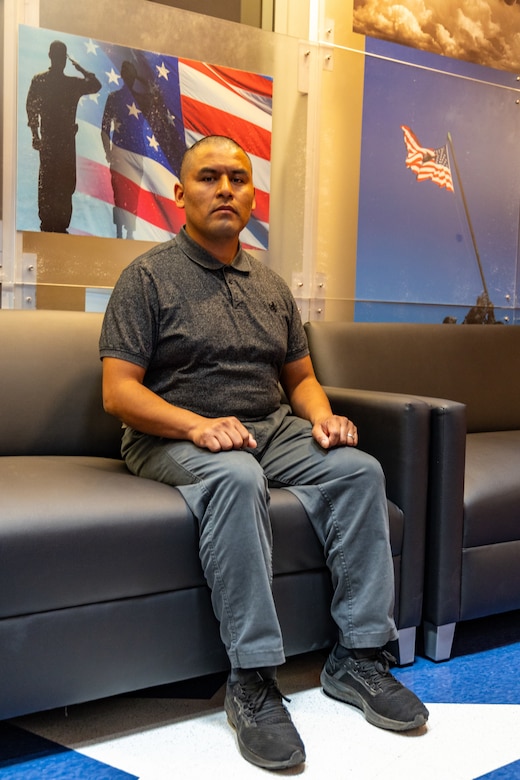 Jonas Sinhue Hernandez poses for a photograph at the Los Angeles Military Entrance Processing Station in El Segundo, Calif., April 1. Hernandez, a native of Oaxaca, Mexico, and graduate of Wallis Annenberg High School, is participating in the expedited naturalization program during recruit training. The Marine Corps, in collaboration with the United States Citizenship and Immigration Services, have reinstated the expedited naturalization program in order to provide qualified recruits the opportunity to become naturalized U.S. citizens upon completion of recruit training. (U.S. Marine Corps photo by Staff Sgt. Courtney G. White)