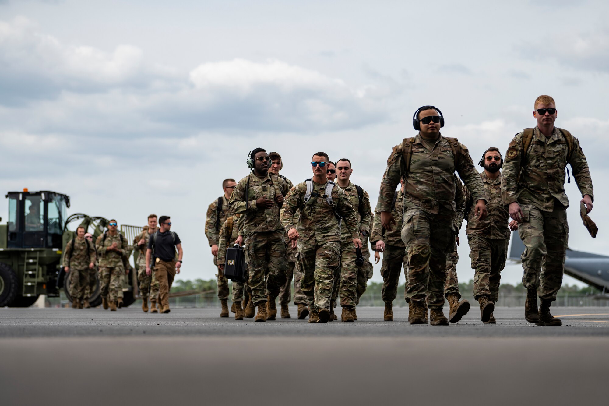 U.S. Air Force Airmen assigned to the 23rd Wing arrive at Avon Park Air Force Range, Florida, for exercise Ready Tiger 24-1, April 9, 2024. The 23rd Wing sent Airmen from every specialty needed to operate expeditionary air bases at dispersed locations. During Ready Tiger 24-1, exercise inspectors will assess the 23rd Wing's proficiency in employing decentralized command and control to fulfill air tasking orders across geographically dispersed areas amid communication challenges, integrating Agile Combat Employment principles such as integrated combat turns, forward aerial refueling points, multi-capable Airmen, and combat search and rescue capabilities. (U.S. Air Force photo by Tech. Sgt. Devin Boyer)