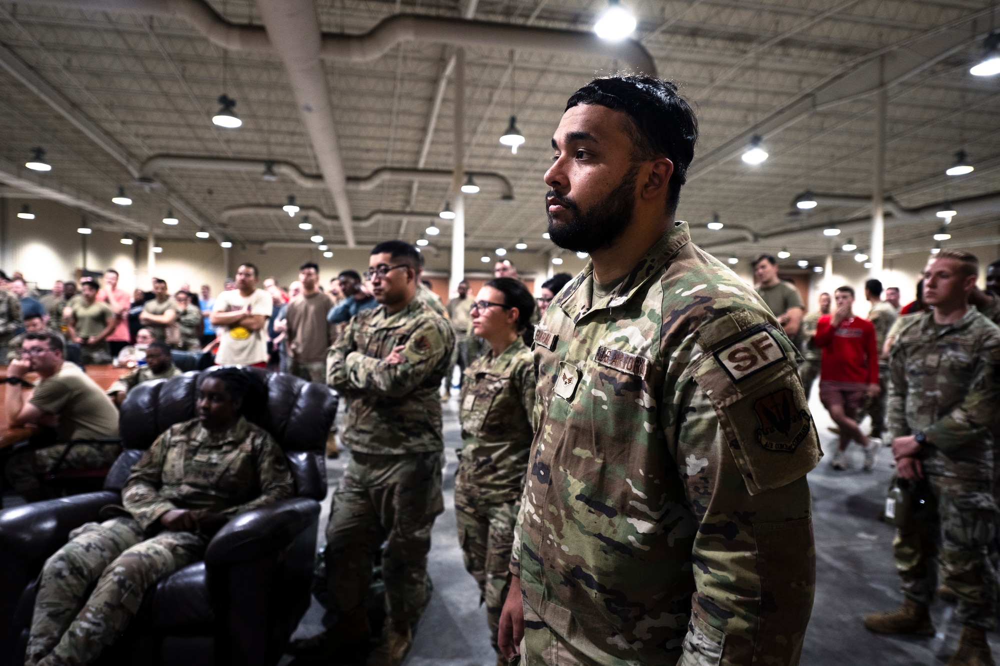 U.S. Air Force Tech. Sgt. Sashia Euley, 23rd Security Forces Alpha Flight sergeant, briefs 23rd Wing Airmen for exercise Ready Tiger 24-1 at Avon Park Air Force Range, Florida, April 9, 2024. Euley provided an overview on how the 23rd SFS will utilize Airmen from different career fields to fill base defense roles to ensure security across the forward operating site. The Ready Tiger 24-1 exercise evaluators will assess the 23rd Wing's proficiency in employing decentralized command and control to fulfill air tasking orders across geographically dispersed areas amid communication challenges. (U.S. Air Force photo by Tech. Sgt. Devin Boyer)