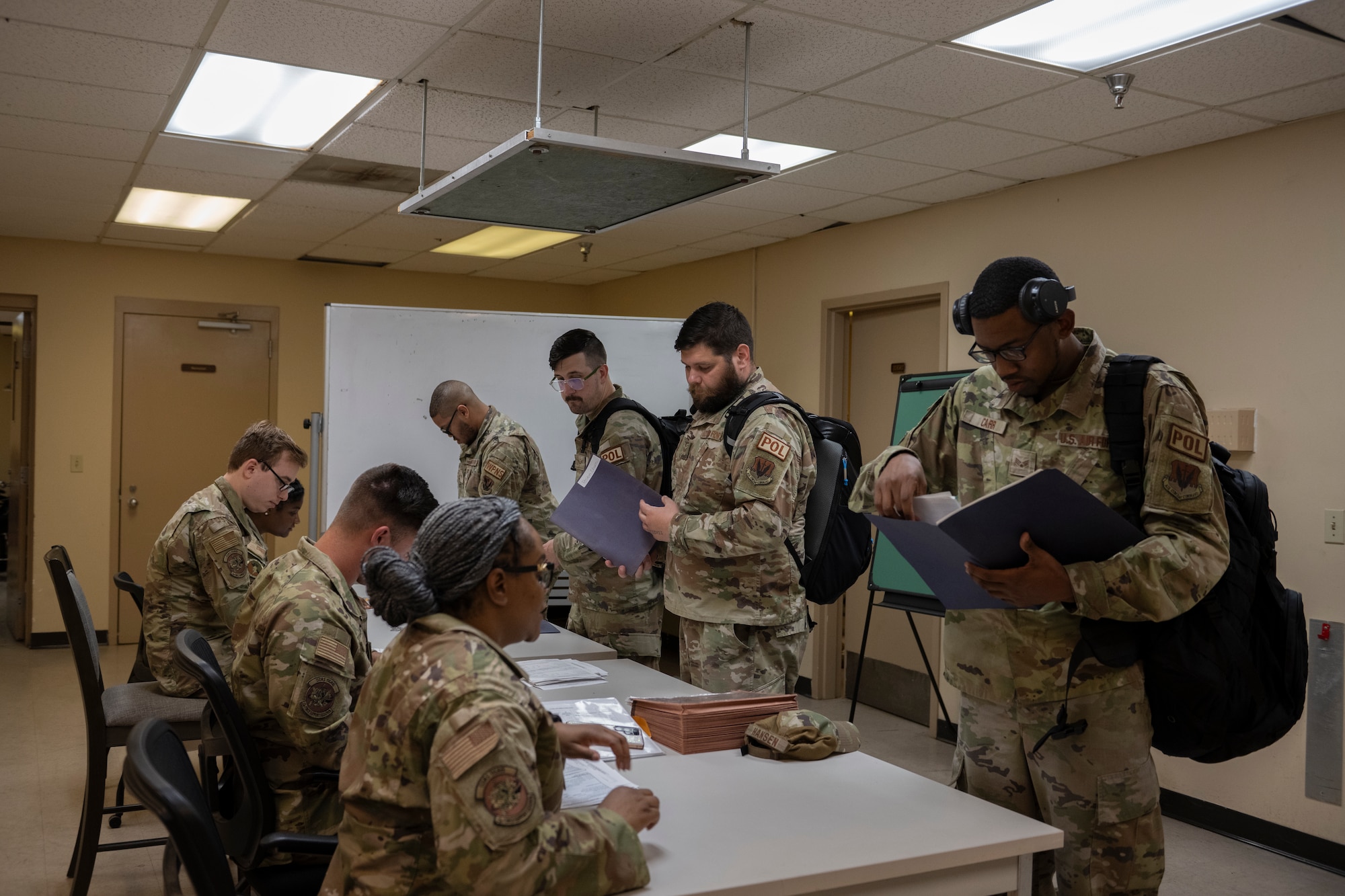 U.S. Air Force Airmen assigned to the 23rd Wing in-process with 23rd Force Support Squadron personnel support for contingency operations team members as part of exercise Ready Tiger 24-1 at Avon Park Air Force Range, Florida, April 8, 2024. PERSCO ensured 100% accountability of Airmen to secure prompt deployment and redeployment of forces. Ready Tiger 24-1 is a readiness exercise demonstrating the 23rd Wing’s ability to plan, prepare and execute operations and maintenance to project air power in contested and dispersed locations, defending the United States’ interests and allies. (U.S. Air Force photo by Senior Airman Rachel Coates)