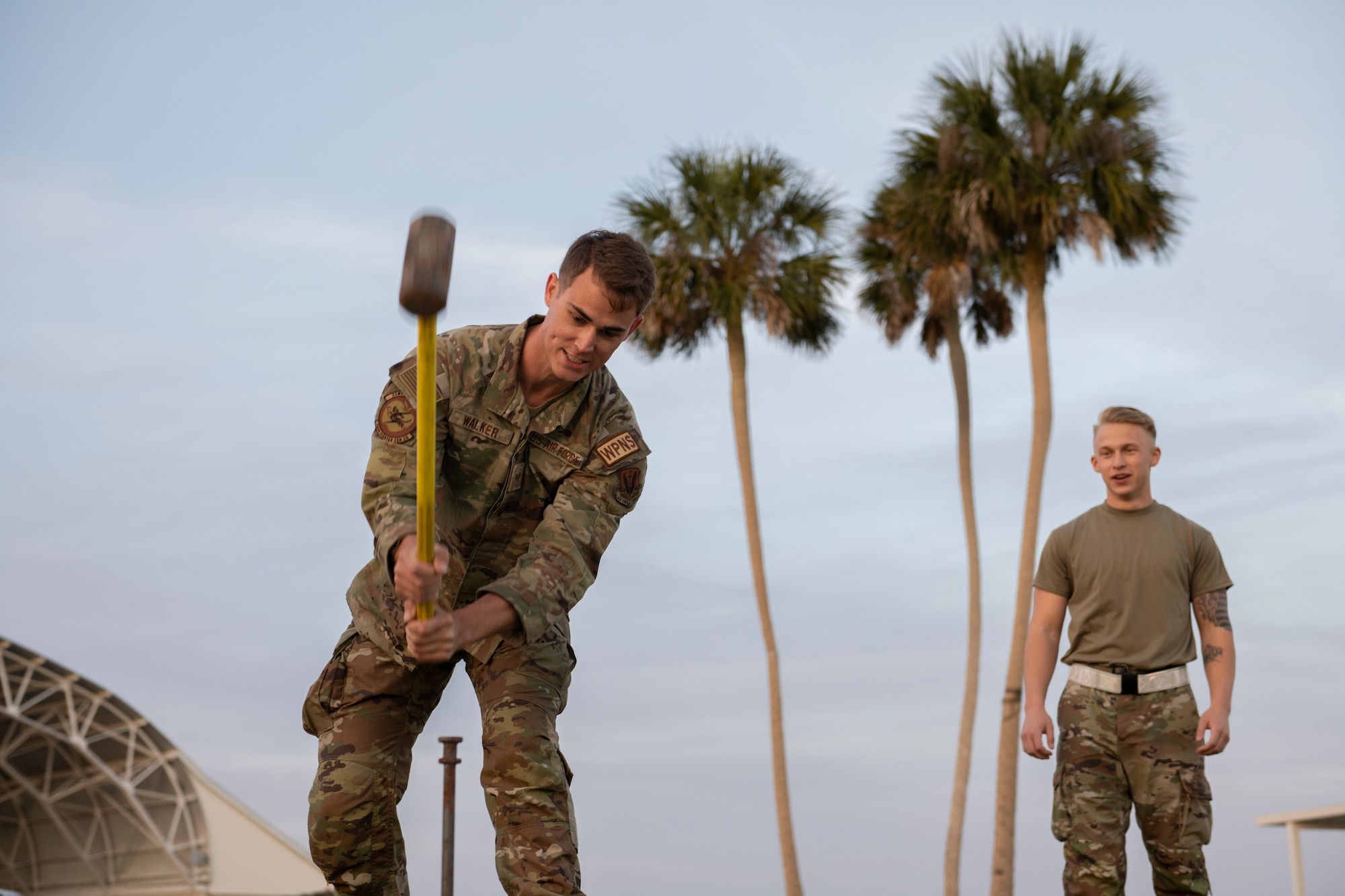 U.S. Air Force Staff Sgt. David Walker, 74th Fighter Generation weapons load crew member, secures a shelter for exercise Ready Tiger 24-1 at Avon Park Air Force Range, Florida, April 8, 2024. The 74th FGS, along with Airmen from various specialties, demonstrated the capacity to handle additional tasks beyond their primary duties. During Ready Tiger 24-1, the 23rd Wing will be evaluated on the integration of Air Force Force Generation principles such as Agile Combat Employment, integrated combat turns, forward aerial refueling points, multi-capable Airmen, and combat search and rescue capabilities. (U.S. Air Force photo by Senior Airman Rachel Coates)