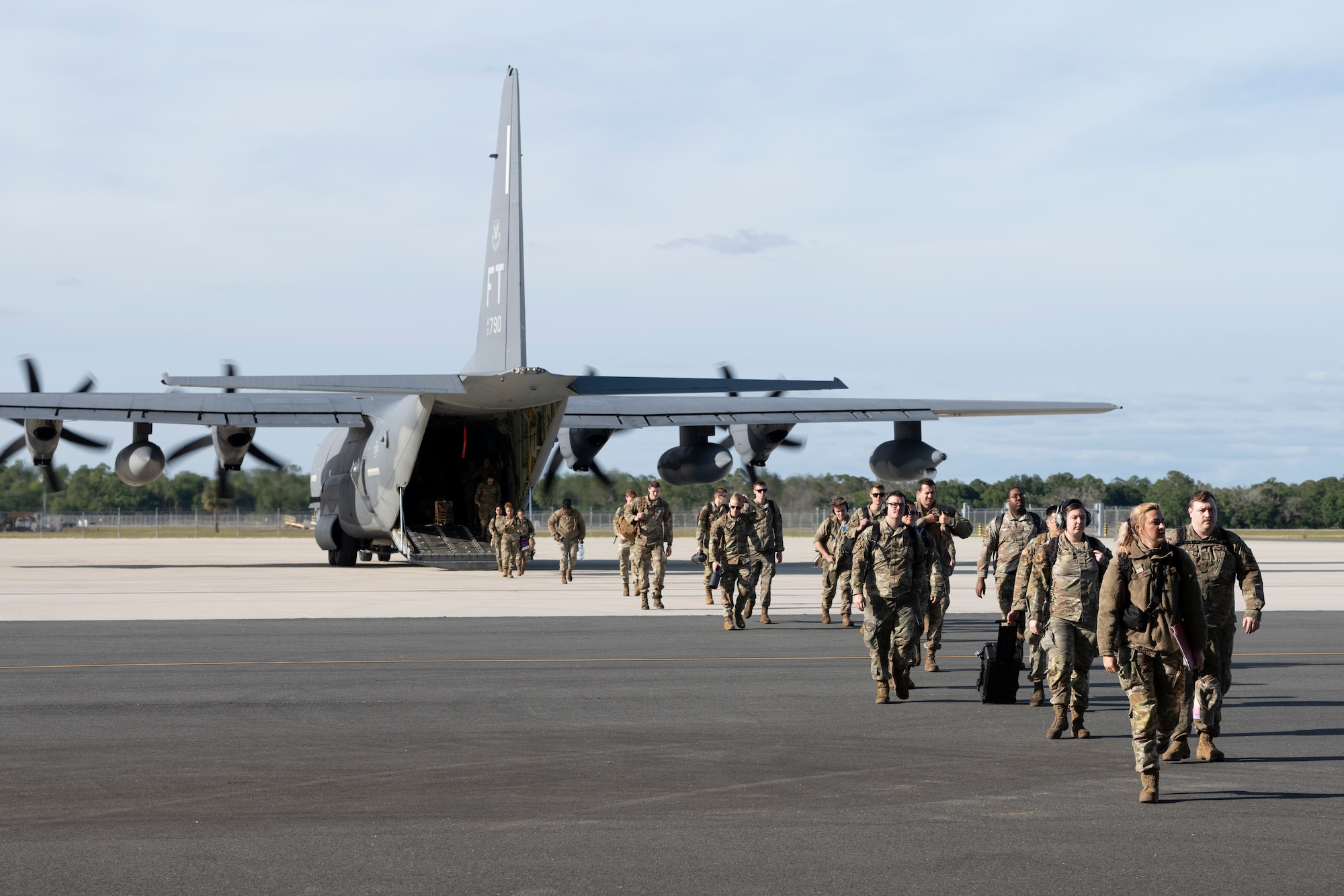 U.S. Air Force Airmen assigned to the 23rd Wing arrive at Avon Park Air Force Range, Florida, April 8, 2024. The 23rd wing conducted several troop movements in the span of three days, dispersing Airmen to forward operating sites as part of exercise Ready Tiger 24-1. Ready Tiger 24-1 is a readiness exercise demonstrating the 23rd Wing’s ability to plan, prepare and execute operations and maintenance to project air power in contested and dispersed locations, defending the United States’ interests and allies. (U.S. Air Force photo by Senior Airman Rachel Coates)