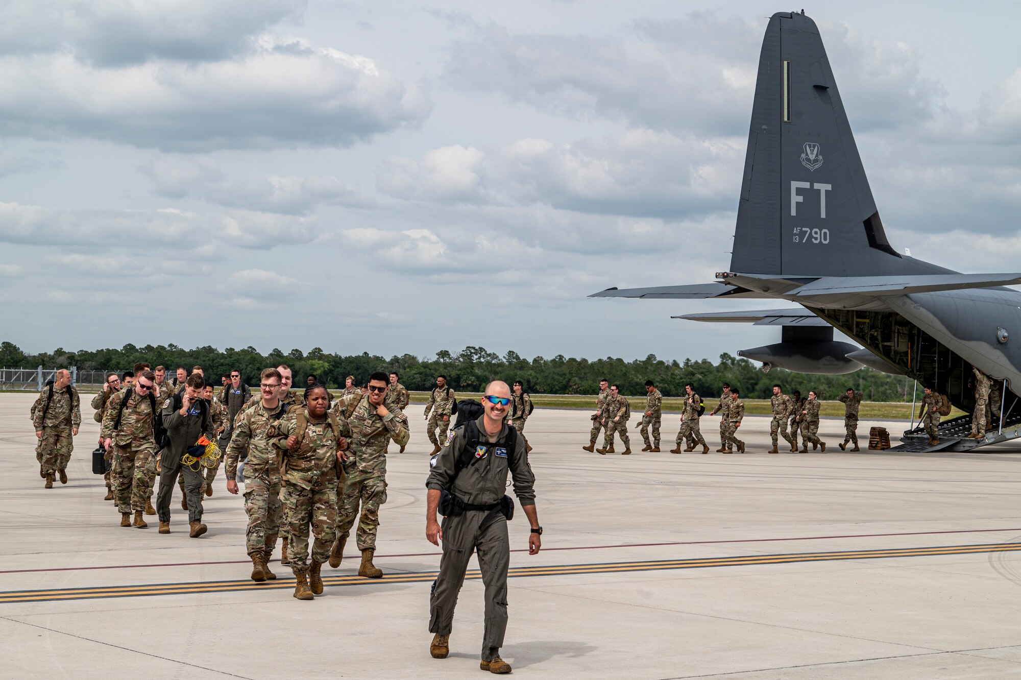 U.S. Air Force Airmen assigned to the 23rd Wing arrive at Avon Park Air Force Range, Florida, for exercise Ready Tiger 24-1, April 9, 2024. Due to its remote location and limited facilities, Avon Park AFR is frequently used to simulate austere location during Agile Combat Employment training.  (U.S. Air Force photo by Airman 1st Class Leonid Soubbotine)