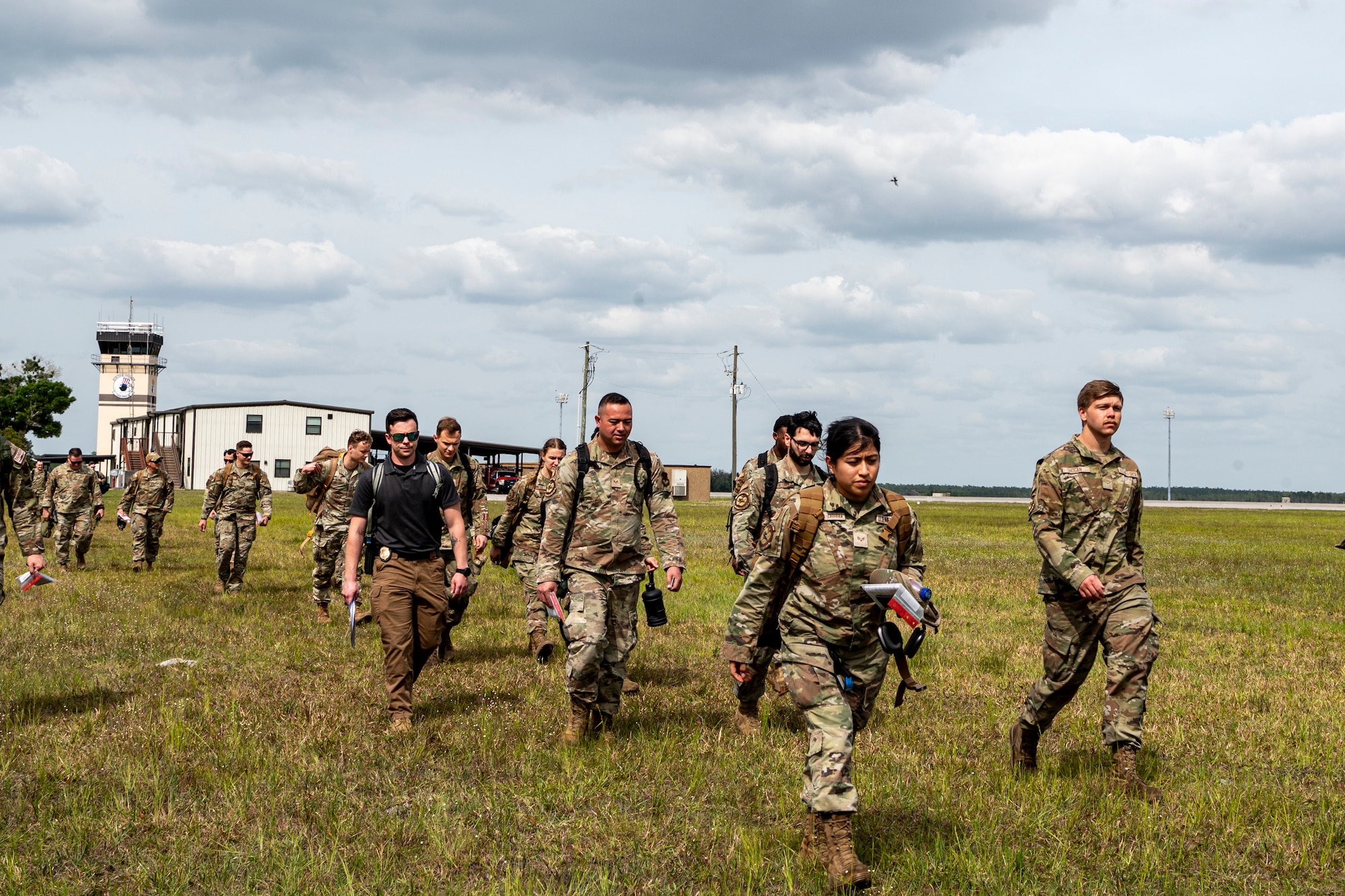 U.S. Air Force Airmen assigned to the 23rd Wing arrive at Avon Park Air Force Range, Florida, for exercise Ready Tiger 24-1, April 9, 2024. After arriving, the personnel support for contingency operations team in-processed each Airman to maintain 100% accountability.  (U.S. Air Force photo by Airman 1st Class Leonid Soubbotine)