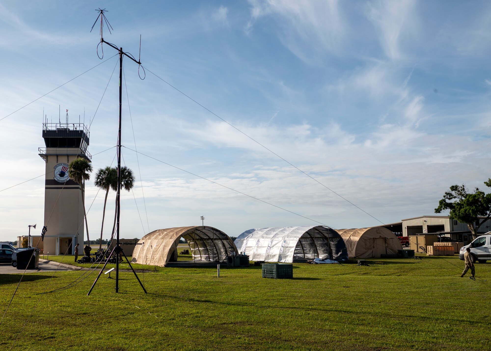 U.S. Air Force Airmen assigned to the 23rd Wing, Moody Air Force Base, Georgia, establish communications equipment and shelters at Avon Park Air Force Range, Florida, for exercise Ready Tiger 24-1, April 9, 2024. Communications enable command and control, giving commanders the ability to direct operations from dispersed locations, enhancing the Air Force’s reach in large areas of responsibility. (U.S. Air Force photo by Airman 1st Class Leonid Soubbotine)
