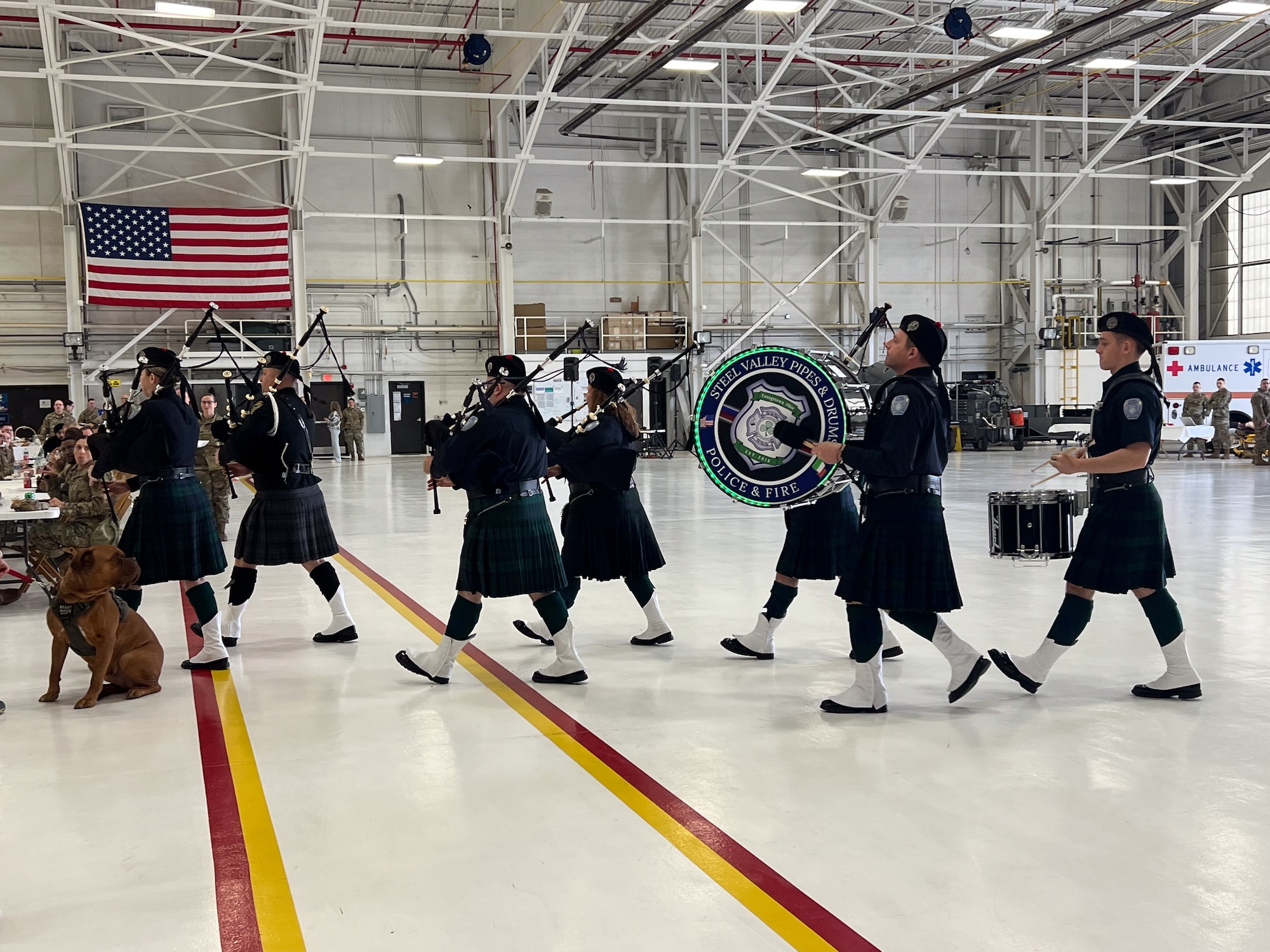 Members of the Steel Valley Pipes and Drums march while piping during the 910th AW Career and Diversity Day, April 6, 2024, at Youngstown Air Reserve Station, Ohio.