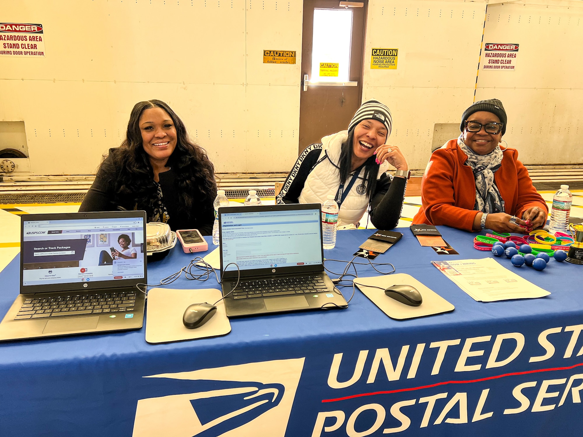 Members of the United States Postal Service, pose for a photo during the 910th AW Career and Diversity Day, April 6, 2024, at Youngstown Air Reserve Station.