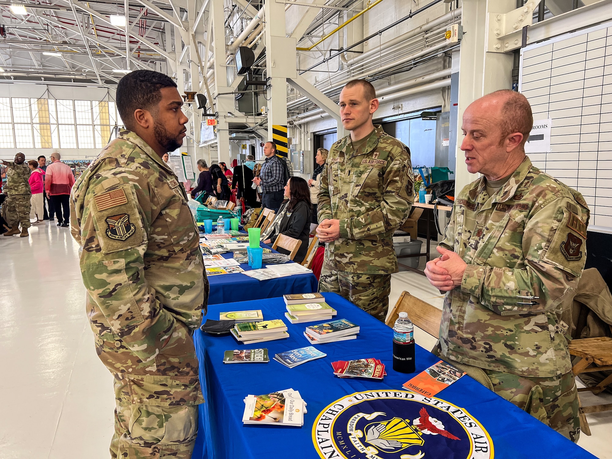 910th Airlift Wing Airmen discuss aspects of becoming part of the chaplaincy during the 910th AW Career and Diversity Day, April 6, 2024, at Youngstown Air Reserve Station, Ohio.