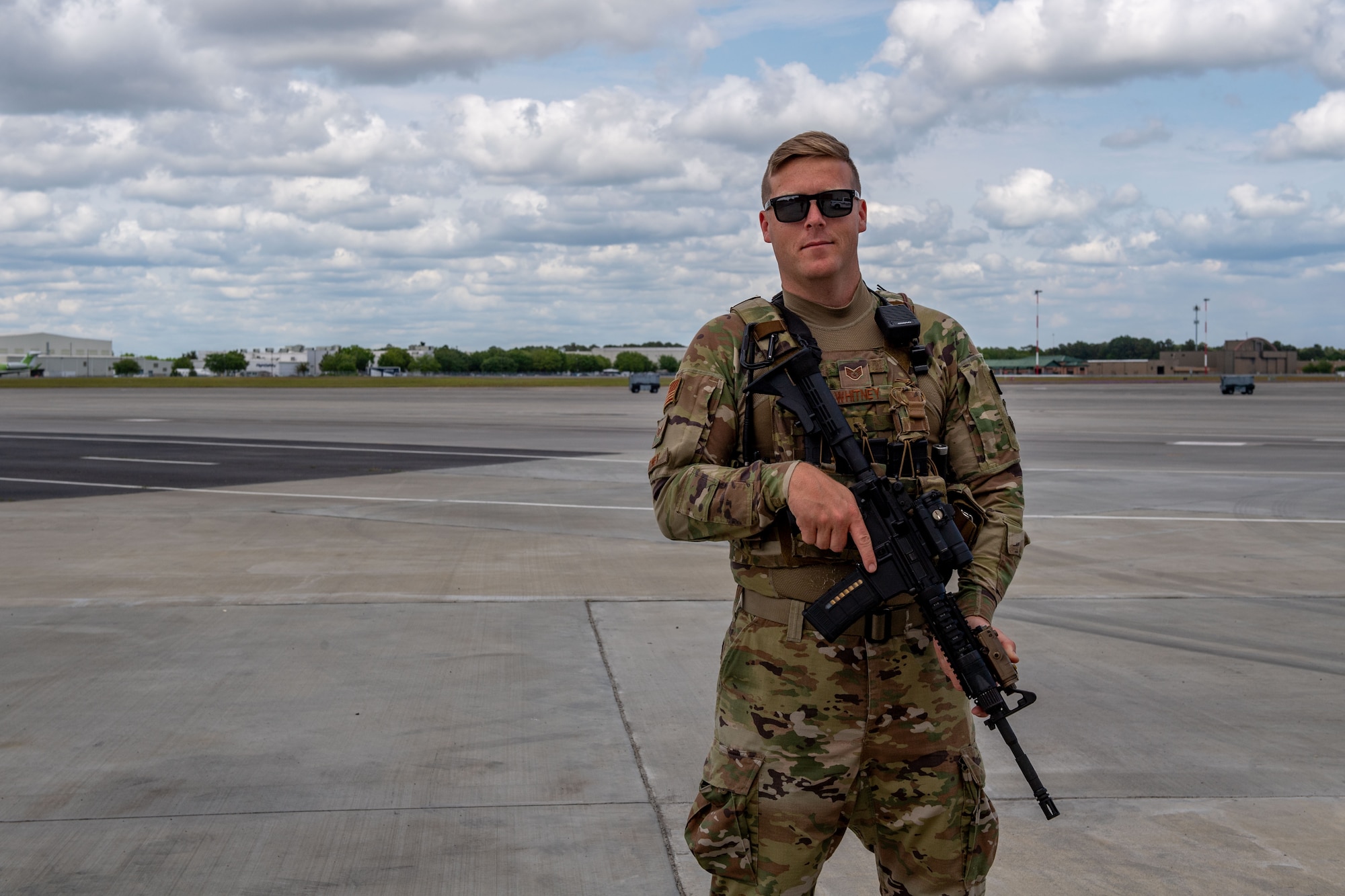 U.S. Air Force Staff Sgt. Samuel Whitney, 23rd Security Forces Squadron noncommissioned officer in charge of training, guards the flight line during exercise Ready Tiger 24-1 at Savannah Air National Guard Base, Georgia, April 9, 2024. During Ready Tiger 24-1, the 23rd Wing will be evaluated on the integration of Air Force Force Generation principles such as Agile Combat Employment, integrated combat turns, forward aerial refueling points, multi-capable Airmen, and combat search and rescue capabilities. (U.S. Air Force photo by Senior Airman Courtney Sebastianelli)