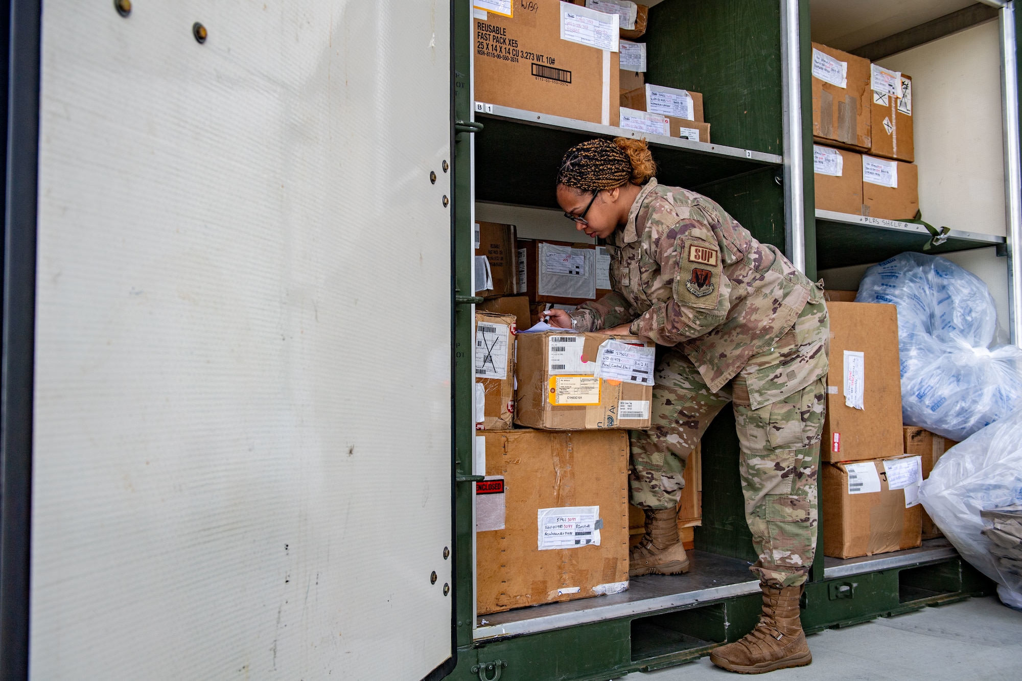 U.S. Air Force Senior Airman Syana Rea, 23rd Logistics Readiness Squadron decentralized material support journeyman, inventories an internal slingable unit (ISU90 kit) during Exercise Ready Tiger 24-1 in Savannah, Georgia, April 9, 2024. Built upon Air Combat Command's directive to assert air power in contested environments, Exercise Ready Tiger 24-1 aims to test and enhance the 23rd Wing’s proficiency in executing Lead Wing and Expeditionary Air Base concepts through Agile Combat Employment and command and control operations. (U.S. Air Force photo by Senior Airman Courtney Sebastianelli)