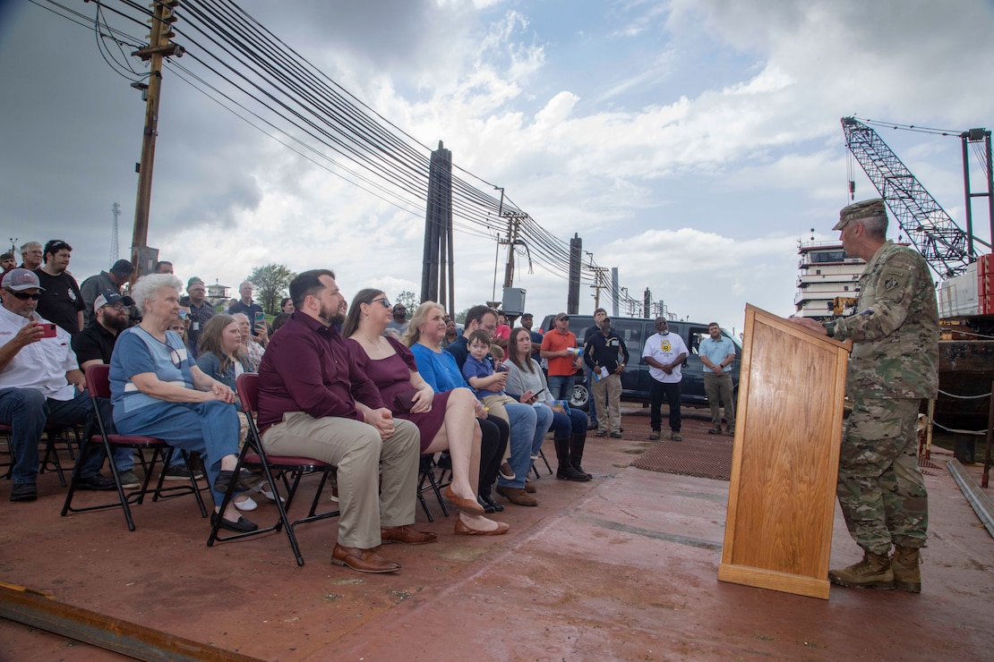 The  U.S. Army Corps of Engineers, Memphis District, christened its new dry dock during a ceremony held at Ensley Engineer Yard, April 2, 2024.

The dry dock was named after Billy Manley, who worked as the yards and docks chief for the district until his passing in 2020. 

More than 80 people attended the christening, including several members of Manley's family, his friends, and district employees. In keeping with USACE tradition, Manley's wife, Teresa Manley, conducted the act of christening and District Commander Col. Brian Sawser directed it to service to the current chief of yards and docks, Dennis Lewis.

The Dry Dock Manley was constructed at Conrad Shipyard in Morgan City, Louisiana, before arriving at Ensley Engineer Yard on December 15, 2023. It is 168 feet long, has a 77-foot beam, a draft of 4.5 feet, and a lifting capacity of 1000 tons.