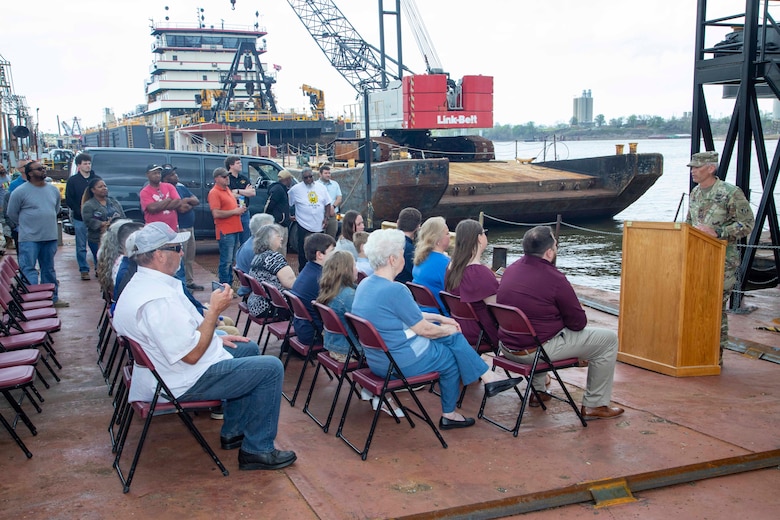 The  U.S. Army Corps of Engineers, Memphis District, christened its new dry dock during a ceremony held at Ensley Engineer Yard, April 2, 2024.

The dry dock was named after Billy Manley, who worked as the yards and docks chief for the district until his passing in 2020. 

More than 80 people attended the christening, including several members of Manley's family, his friends, and district employees. In keeping with USACE tradition, Manley's wife, Teresa Manley, conducted the act of christening and District Commander Col. Brian Sawser directed it to service to the current chief of yards and docks, Dennis Lewis.

The Dry Dock Manley was constructed at Conrad Shipyard in Morgan City, Louisiana, before arriving at Ensley Engineer Yard on December 15, 2023. It is 168 feet long, has a 77-foot beam, a draft of 4.5 feet, and a lifting capacity of 1000 tons.
