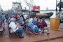 The  U.S. Army Corps of Engineers, Memphis District, christened its new dry dock during a ceremony held at Ensley Engineer Yard, April 2, 2024.

The dry dock was named after Billy Manley, who worked as the yards and docks chief for the district until his passing in 2020. 

More than 80 people attended the christening, including several members of Manley's family, his friends, and district employees. In keeping with USACE tradition, Manley's wife, Teresa Manley, conducted the act of christening and District Commander Col. Brian Sawser directed it to service to the current chief of yards and docks, Dennis Lewis.

The Dry Dock Manley was constructed at Conrad Shipyard in Morgan City, Louisiana, before arriving at Ensley Engineer Yard on December 15, 2023. It is 168 feet long, has a 77-foot beam, a draft of 4.5 feet, and a lifting capacity of 1000 tons.