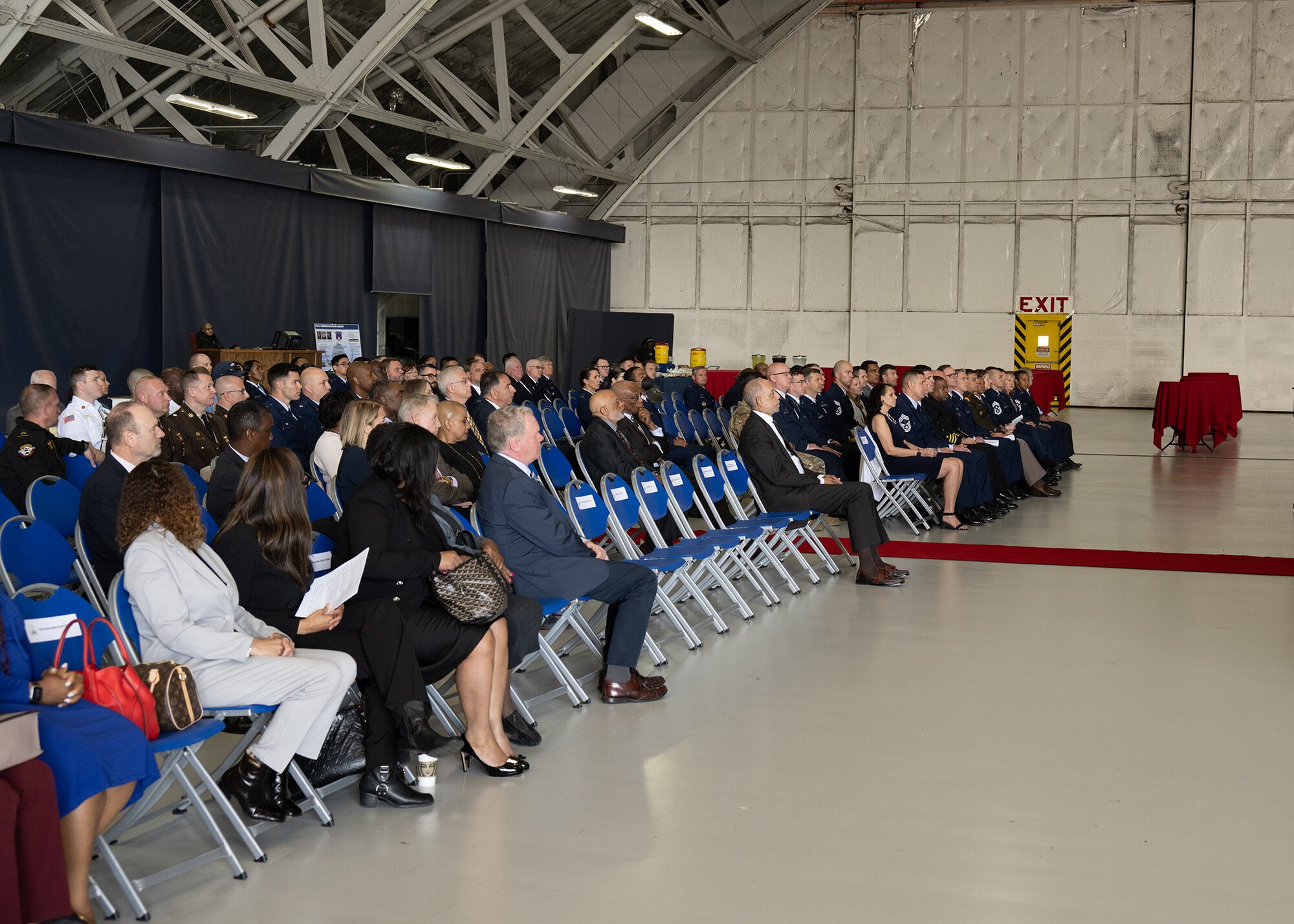 The crowd at the third annual Joint Base Andrews State of the Base Address, listens as U.S. Air Force Col. Todd E. Randolph, 316th Wing and installation commander, gives his remarks, April 10, 2024.