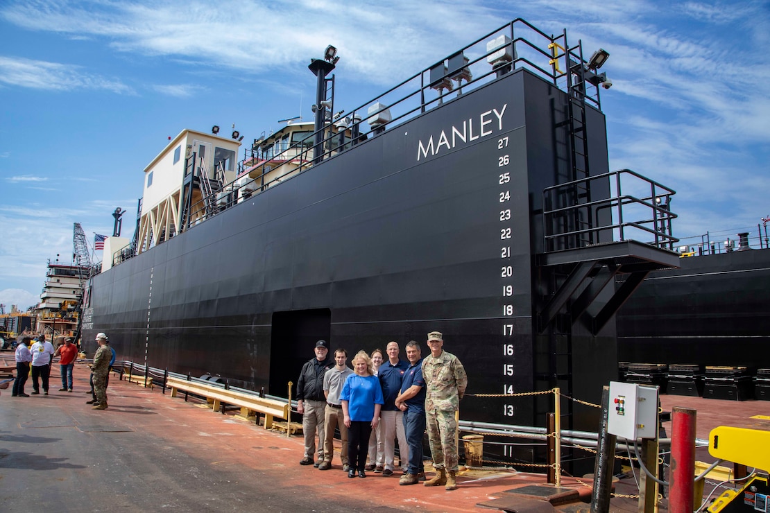 The  U.S. Army Corps of Engineers, Memphis District, christened its new dry dock during a ceremony held at Ensley Engineer Yard, April 2, 2024.

The dry dock was named after Billy Manley, who worked as the yards and docks chief for the district until his passing in 2020. 

More than 80 people attended the christening, including several members of Manley's family, his friends, and district employees. In keeping with USACE tradition, Manley's wife, Teresa Manley, conducted the act of christening and District Commander Col. Brian Sawser directed it to service to the current chief of yards and docks, Dennis Lewis.

The Dry Dock Manley was constructed at Conrad Shipyard in Morgan City, Louisiana, before arriving at Ensley Engineer Yard on December 15, 2023. It is 168 feet long, has a 77-foot beam, a draft of 4.5 feet, and a lifting capacity of 1000 tons.