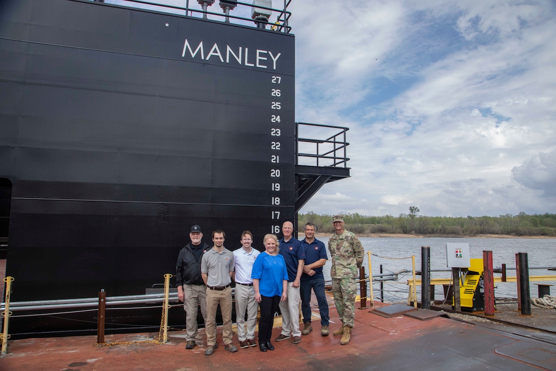 The  U.S. Army Corps of Engineers, Memphis District, christened its new dry dock during a ceremony held at Ensley Engineer Yard, April 2, 2024.

The dry dock was named after Billy Manley, who worked as the yards and docks chief for the district until his passing in 2020. 

More than 80 people attended the christening, including several members of Manley's family, his friends, and district employees. In keeping with USACE tradition, Manley's wife, Teresa Manley, conducted the act of christening and District Commander Col. Brian Sawser directed it to service to the current chief of yards and docks, Dennis Lewis.

The Dry Dock Manley was constructed at Conrad Shipyard in Morgan City, Louisiana, before arriving at Ensley Engineer Yard on December 15, 2023. It is 168 feet long, has a 77-foot beam, a draft of 4.5 feet, and a lifting capacity of 1000 tons.