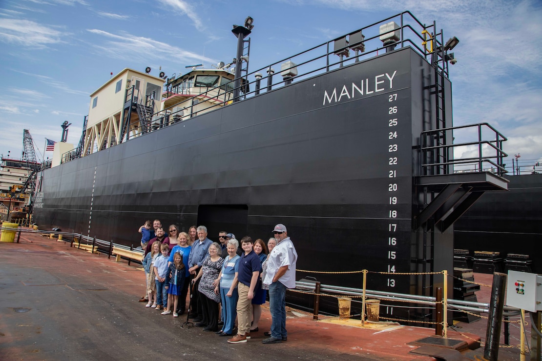 The  U.S. Army Corps of Engineers, Memphis District, christened its new dry dock during a ceremony held at Ensley Engineer Yard, April 2, 2024.

The dry dock was named after Billy Manley, who worked as the yards and docks chief for the district until his passing in 2020. 

More than 80 people attended the christening, including several members of Manley's family, his friends, and district employees. In keeping with USACE tradition, Manley's wife, Teresa Manley, conducted the act of christening and District Commander Col. Brian Sawser directed it to service to the current chief of yards and docks, Dennis Lewis.

The Dry Dock Manley was constructed at Conrad Shipyard in Morgan City, Louisiana, before arriving at Ensley Engineer Yard on December 15, 2023. It is 168 feet long, has a 77-foot beam, a draft of 4.5 feet, and a lifting capacity of 1000 tons.
