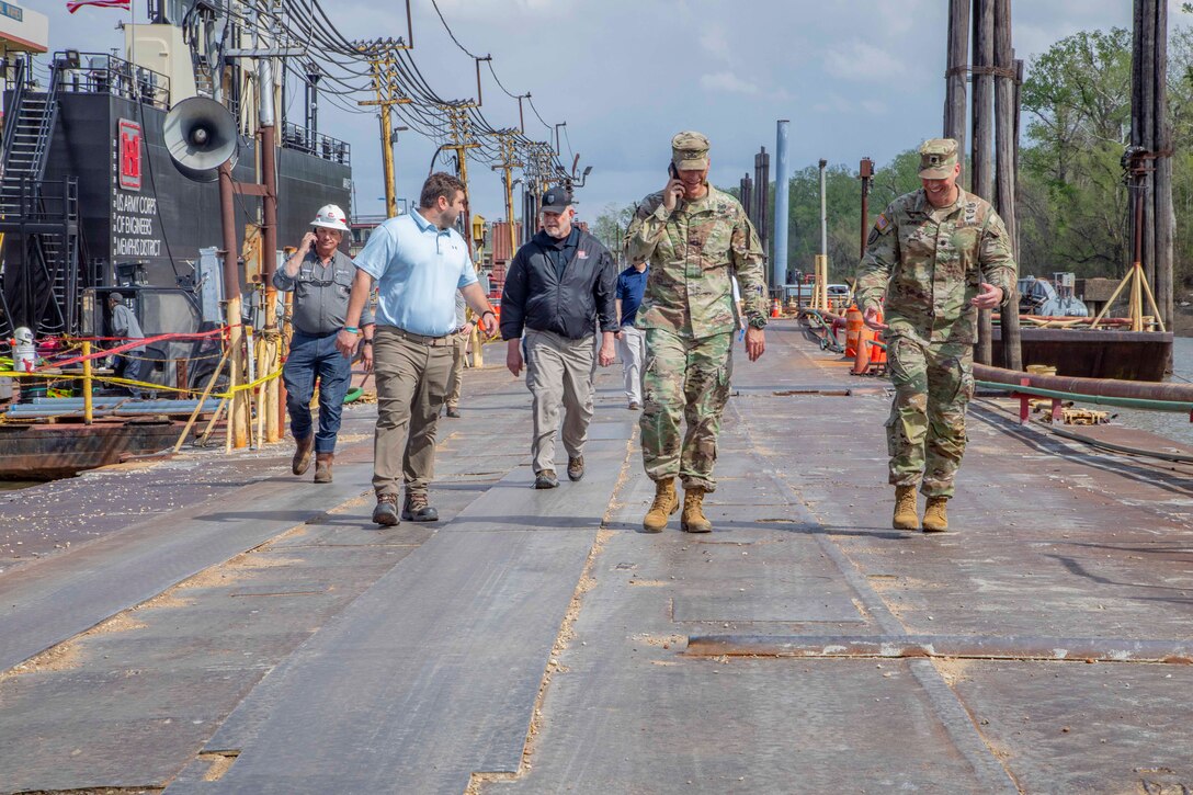 The  U.S. Army Corps of Engineers, Memphis District, christened its new dry dock during a ceremony held at Ensley Engineer Yard, April 2, 2024.

The dry dock was named after Billy Manley, who worked as the yards and docks chief for the district until his passing in 2020. 

More than 80 people attended the christening, including several members of Manley's family, his friends, and district employees. In keeping with USACE tradition, Manley's wife, Teresa Manley, conducted the act of christening and District Commander Col. Brian Sawser directed it to service to the current chief of yards and docks, Dennis Lewis.

The Dry Dock Manley was constructed at Conrad Shipyard in Morgan City, Louisiana, before arriving at Ensley Engineer Yard on December 15, 2023. It is 168 feet long, has a 77-foot beam, a draft of 4.5 feet, and a lifting capacity of 1000 tons.