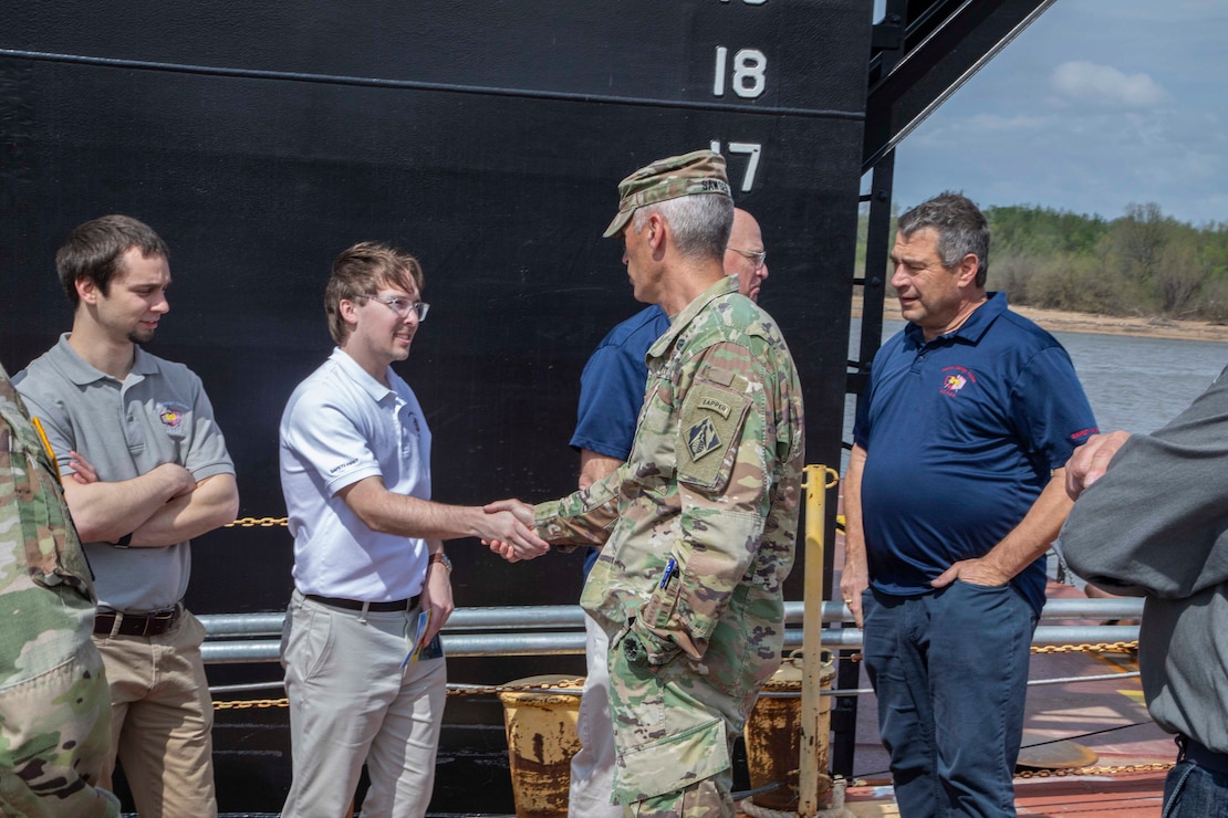 The  U.S. Army Corps of Engineers, Memphis District, christened its new dry dock during a ceremony held at Ensley Engineer Yard, April 2, 2024.

The dry dock was named after Billy Manley, who worked as the yards and docks chief for the district until his passing in 2020. 

More than 80 people attended the christening, including several members of Manley's family, his friends, and district employees. In keeping with USACE tradition, Manley's wife, Teresa Manley, conducted the act of christening and District Commander Col. Brian Sawser directed it to service to the current chief of yards and docks, Dennis Lewis.

The Dry Dock Manley was constructed at Conrad Shipyard in Morgan City, Louisiana, before arriving at Ensley Engineer Yard on December 15, 2023. It is 168 feet long, has a 77-foot beam, a draft of 4.5 feet, and a lifting capacity of 1000 tons.