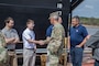 The  U.S. Army Corps of Engineers, Memphis District, christened its new dry dock during a ceremony held at Ensley Engineer Yard, April 2, 2024.

The dry dock was named after Billy Manley, who worked as the yards and docks chief for the district until his passing in 2020. 

More than 80 people attended the christening, including several members of Manley's family, his friends, and district employees. In keeping with USACE tradition, Manley's wife, Teresa Manley, conducted the act of christening and District Commander Col. Brian Sawser directed it to service to the current chief of yards and docks, Dennis Lewis.

The Dry Dock Manley was constructed at Conrad Shipyard in Morgan City, Louisiana, before arriving at Ensley Engineer Yard on December 15, 2023. It is 168 feet long, has a 77-foot beam, a draft of 4.5 feet, and a lifting capacity of 1000 tons.