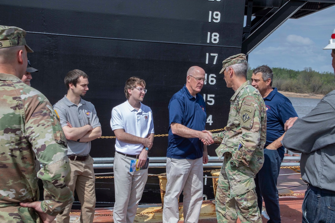 The  U.S. Army Corps of Engineers, Memphis District, christened its new dry dock during a ceremony held at Ensley Engineer Yard, April 2, 2024.

The dry dock was named after Billy Manley, who worked as the yards and docks chief for the district until his passing in 2020. 

More than 80 people attended the christening, including several members of Manley's family, his friends, and district employees. In keeping with USACE tradition, Manley's wife, Teresa Manley, conducted the act of christening and District Commander Col. Brian Sawser directed it to service to the current chief of yards and docks, Dennis Lewis.

The Dry Dock Manley was constructed at Conrad Shipyard in Morgan City, Louisiana, before arriving at Ensley Engineer Yard on December 15, 2023. It is 168 feet long, has a 77-foot beam, a draft of 4.5 feet, and a lifting capacity of 1000 tons.