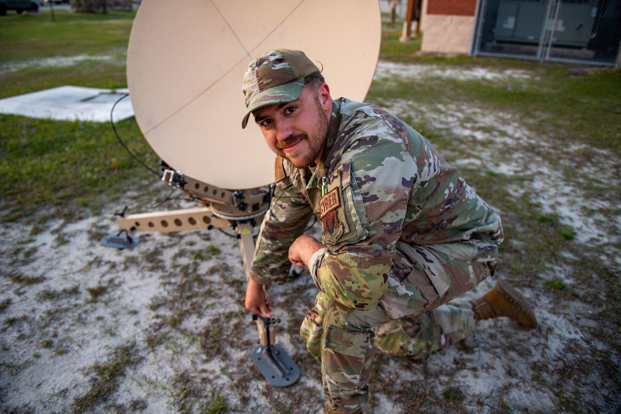 U.S. Air Force Staff Sgt. Nathan Knight, 23rd Communications Squadron infrastructure supervisor, poses for a photo during Exercise Ready Tiger  24-1 at Savannah Air National Guard Base, Georgia, April 8, 2024. During Ready Tiger 24-1, exercise inspectors will assess the 23rd Wing's proficiency in employing decentralized command and control to fulfill air tasking orders across geographically dispersed areas amid communication challenges, integrating Agile Combat Employment principles such as integrated combat turns, forward aerial refueling points, multi-capable Airmen, and combat search and rescue capabilities. (U.S. Air Force photo by Senior Airman Courtney Sebastianelli)