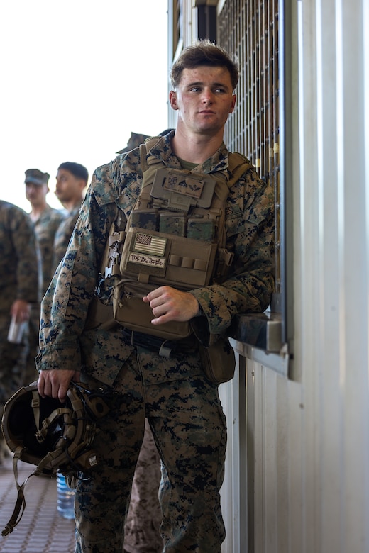 U.S. Marine Corps Cpl. Kaleb Waggoner, a squad leader with Weapons Company, 2nd Battalion, 5th Marine Regiment (Reinforced), Marine Rotational Force – Darwin 24.3, waits to draw an M252 81 mm mortar system from the armory at Robertson Barracks, Darwin, NT, Australia, April 8, 2024. MRF-D 24.3 is part of an annual six-month rotational deployment to enhance interoperability with the Australian Defense Force and Allies and partners and provide a forward-postured crisis response force in the Indo-Pacific. Waggoner is a native of Ohio. (U.S. Marine Corps photo by Cpl. Earik Barton)