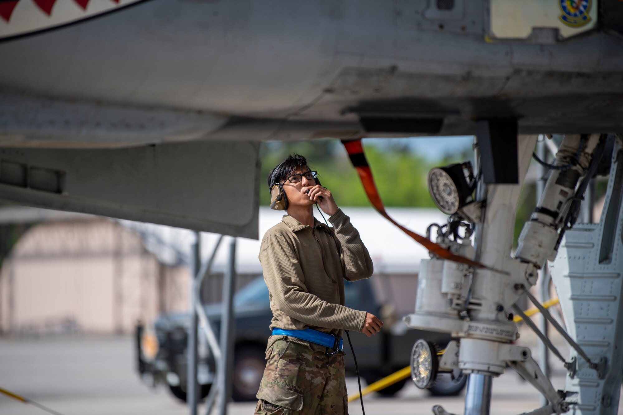 A U.S. Air Force Airman assigned to the 23rd Maintenance Group prepares an A-10C Thunderbolt II for take-off during Exercise Ready Tiger 24-1 at Moody Air Force Base, Georgia, April 9, 2024. The group oversees the 23rd Wing's maintenance training program and ensures the workforce qualification and capability for worldwide development of personnel and cargo. During Ready Tiger 24-1, exercise inspectors will assess the 23rd Wing's proficiency in employing decentralized command and control to fulfil air tasking orders across geographically dispersed areas amid communication challenges, integrating Agile Combat Employment principles such as integrated combat turns, forward aerial refuelling points, multi-capable Airmen, and combat search and rescue capabilities. (U.S. Air Force photo by 2nd Lt. Benjamin Williams)
