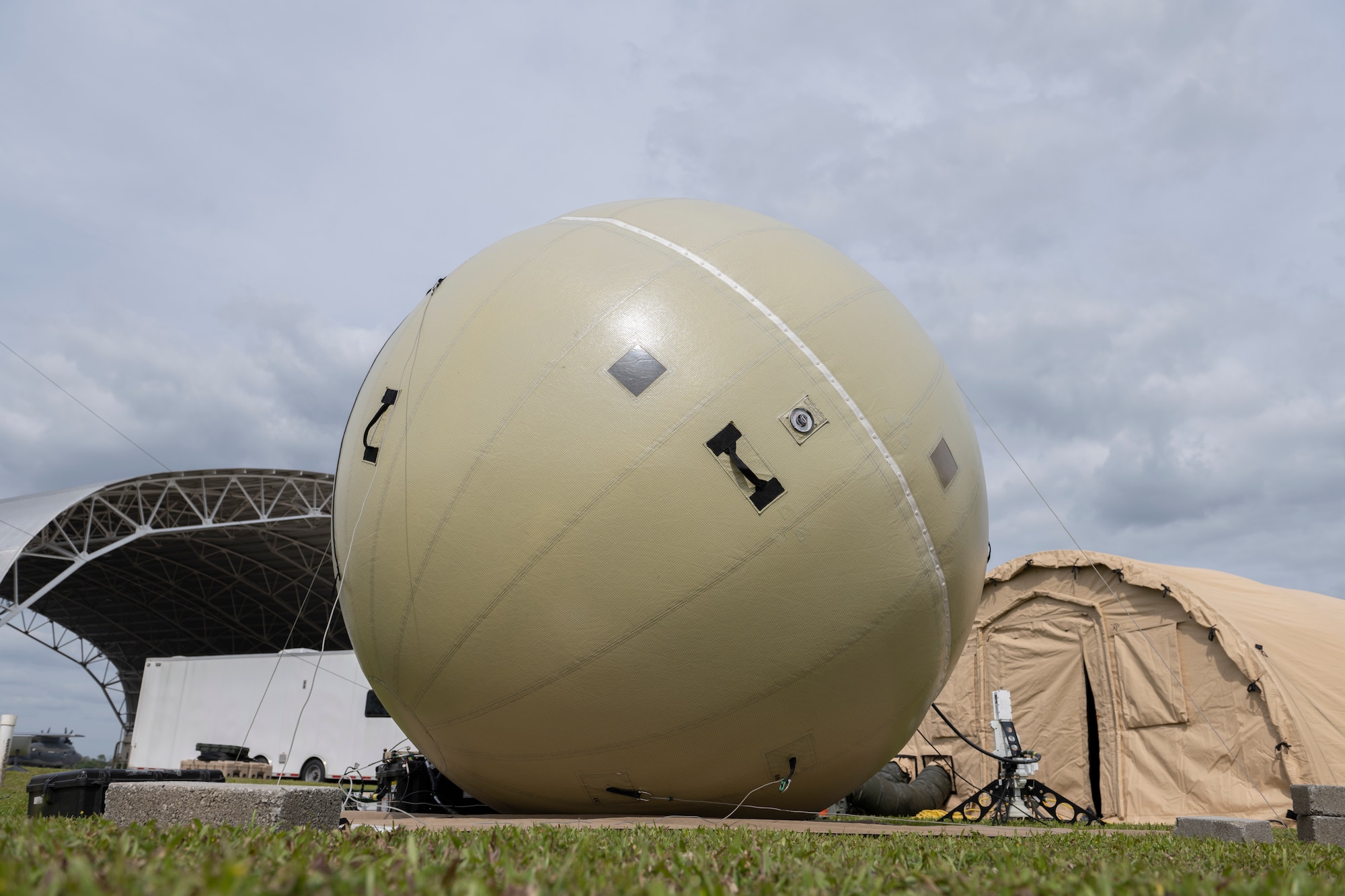 A ground antenna transmit and receive (GATR) ball, assigned to the 51st Combat Communications Squadron, provides network capabilities for Exercise Ready Tiger 24-1 at Avon Park Air Force Range, Florida, April 9, 2024. The GATR ball was used during Ready Tiger 24-1 to transmit data communication between personnel in geographically separated areas. Built upon Air Combat Command's directive to assert air power in contested environments, Exercise Ready Tiger 24-1 aims to test and enhance the 23rd Wing’s proficiency in executing Lead Wing and Expeditionary Air Base concepts through Agile Combat Employment and command and control operations. (U.S. Air Force photo by Senior Airman Rachel Coates)
