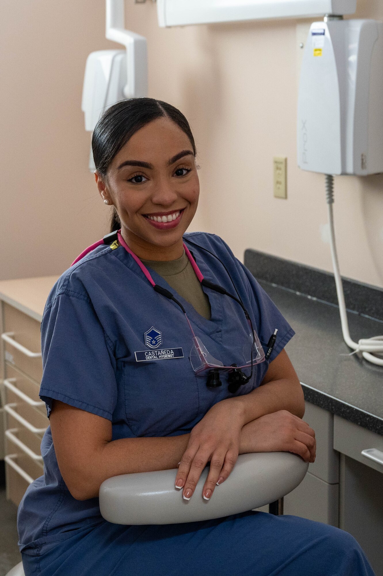 U.S. Air Force Master Sgt. Victoria Castaneda, 354th Operational Medical Readiness Squadron chief of preventive dentistry, poses for a photo at Eielson Air Force Base, Alaska, April 3, 2024.