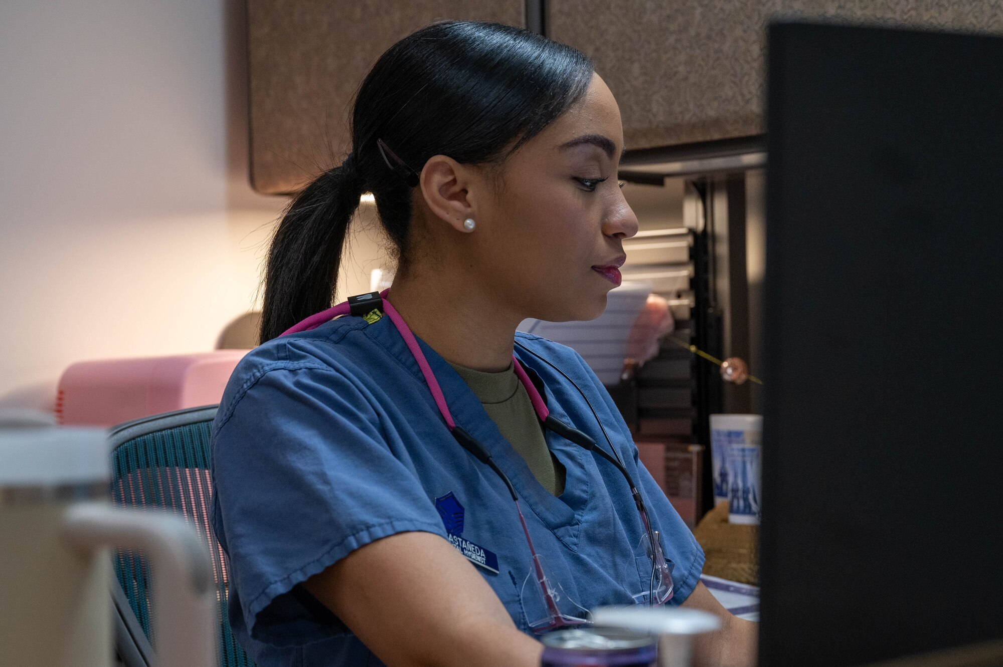 U.S. Air Force Master Sgt. Victoria Castaneda, 354th Operational Medical Readiness Squadron chief of preventive dentistry, poses for a photo at Eielson Air Force Base, Alaska, April 3, 2024.