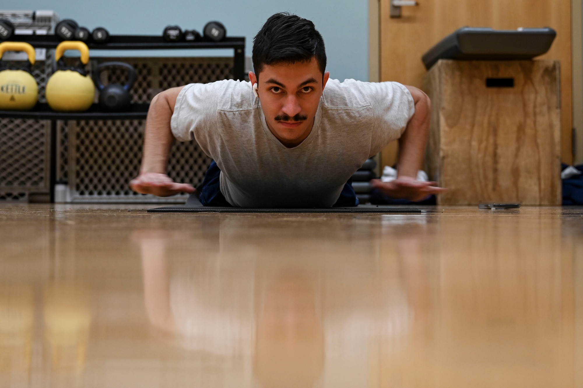 Airman completes hand release push-ups