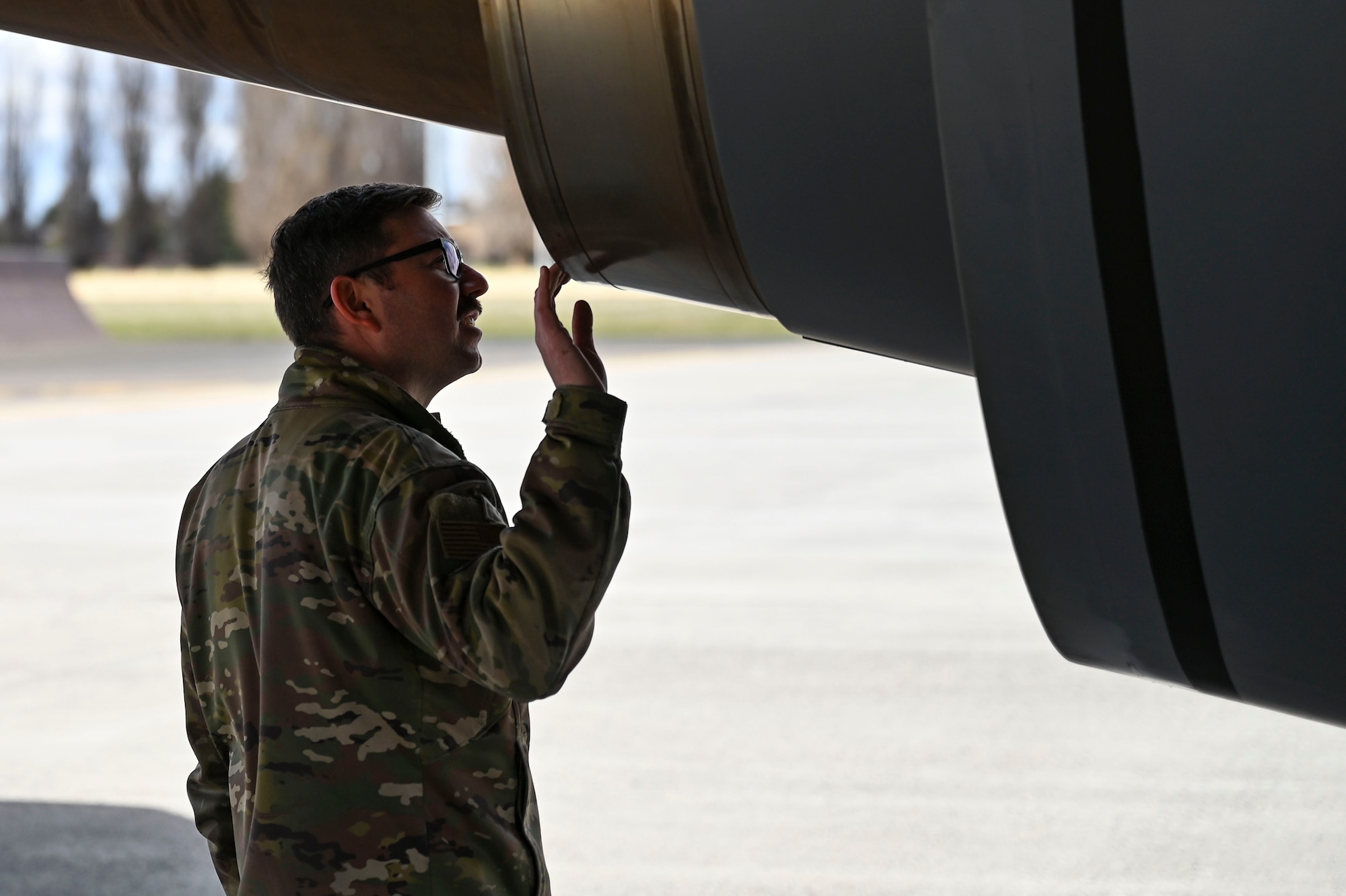 Airman inspects aircraft