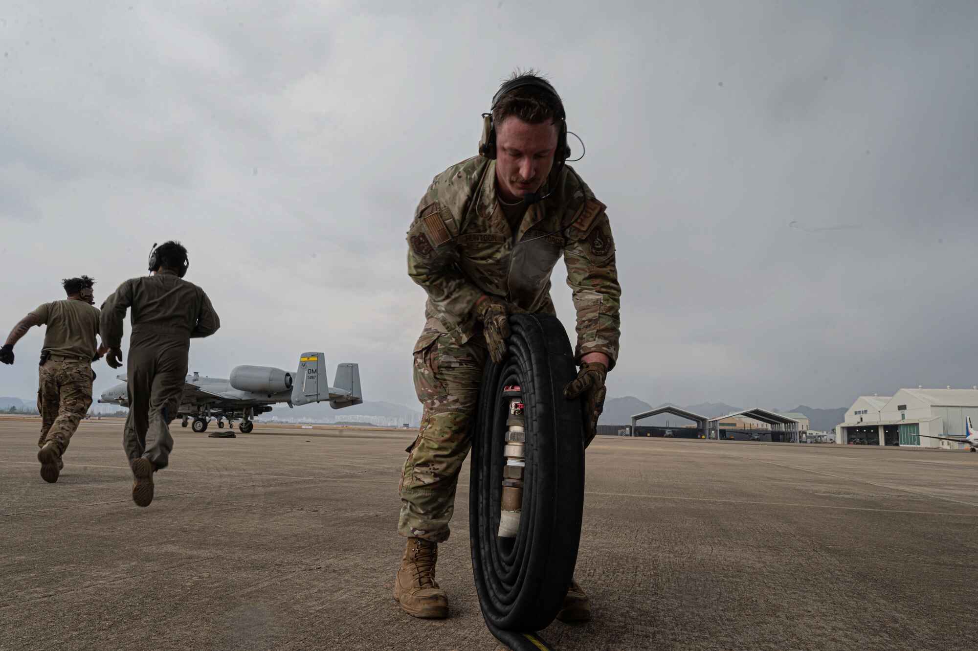 Airmen refueling aircraft