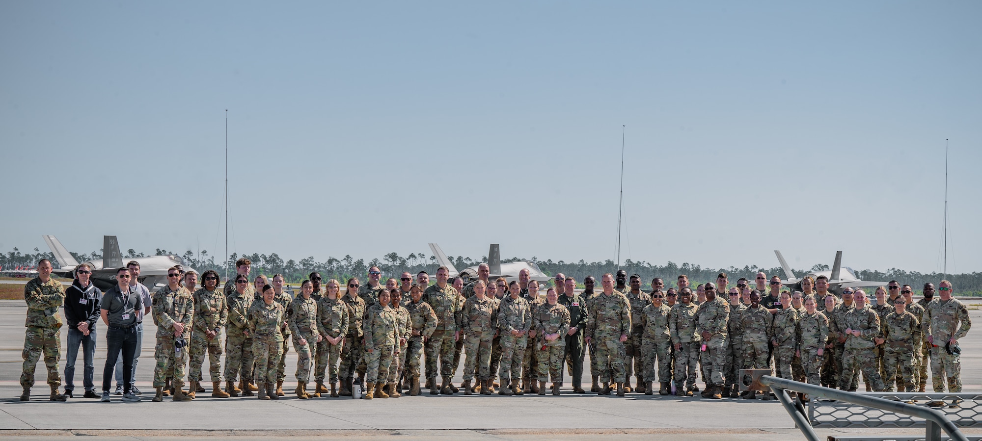 Airmen line up for a photo