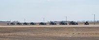 Airmen assigned to the 705th Munitions Squadron conduct convoy operations during Prairie Vigilance 24-3 at Minot Air Force Base, North Dakota, April 6, 2024. Prairie Vigilance serves to assure allies and partners that the U.S. is ready to execute nuclear operations and global strike anytime, anywhere, in order to deter and, if necessary, respond to strategic attack. (U.S. Air Force photo by Airman 1st Class Kyle Wilson)